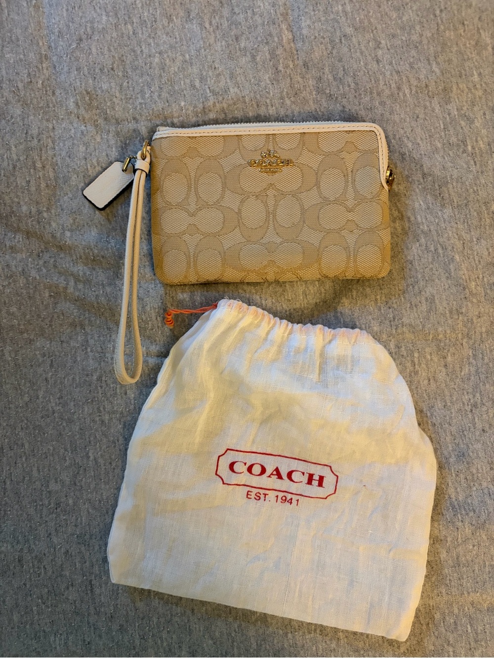 Tan coach wristlet
